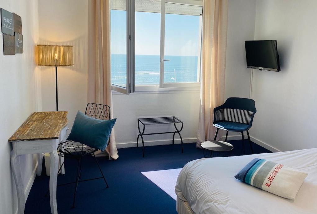 Face Aux Flots Hotel La Cotiniere Bagian luar foto