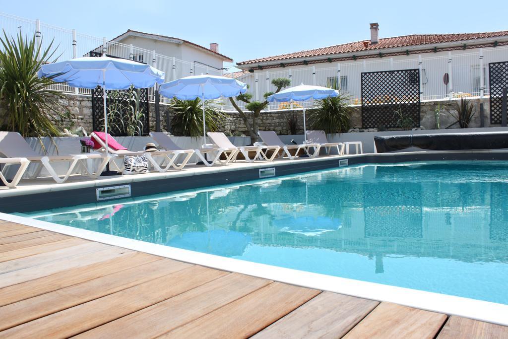 Face Aux Flots Hotel La Cotiniere Bagian luar foto
